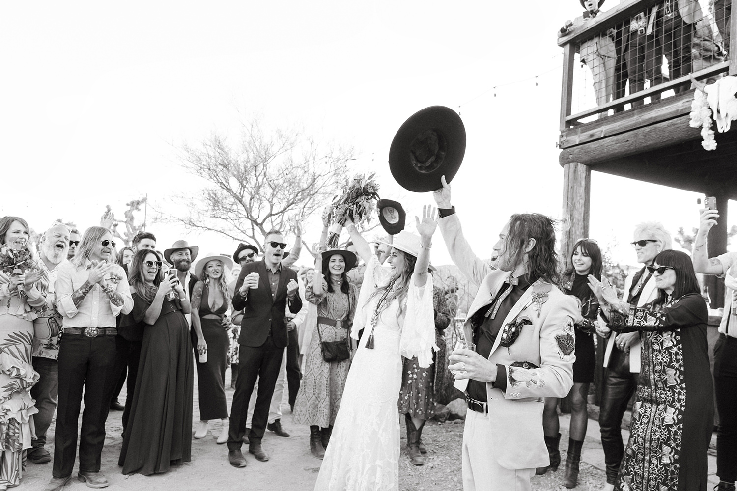 Bride and Groom's being celebrated at their western wedding in Joshua Tree by San Diego Wedding Photographer Kadi Tobin