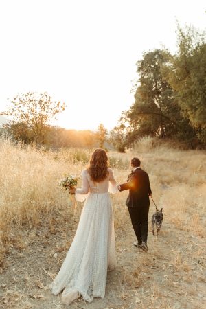 Sunset Photos with their dog at Yokayo Ranch on their wedding day