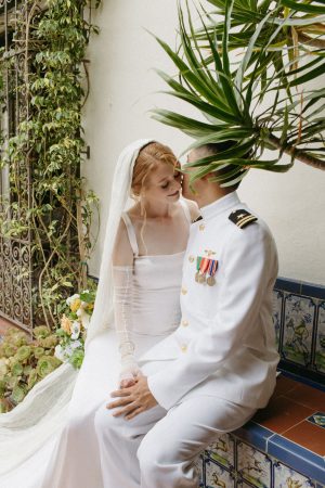 Modern and timeless bride and groom during their first look at the darlington house