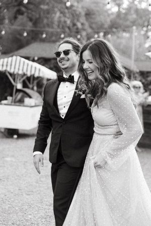 Bride and Groom walk into their wedding reception at Yokayo Ranch in mendocino